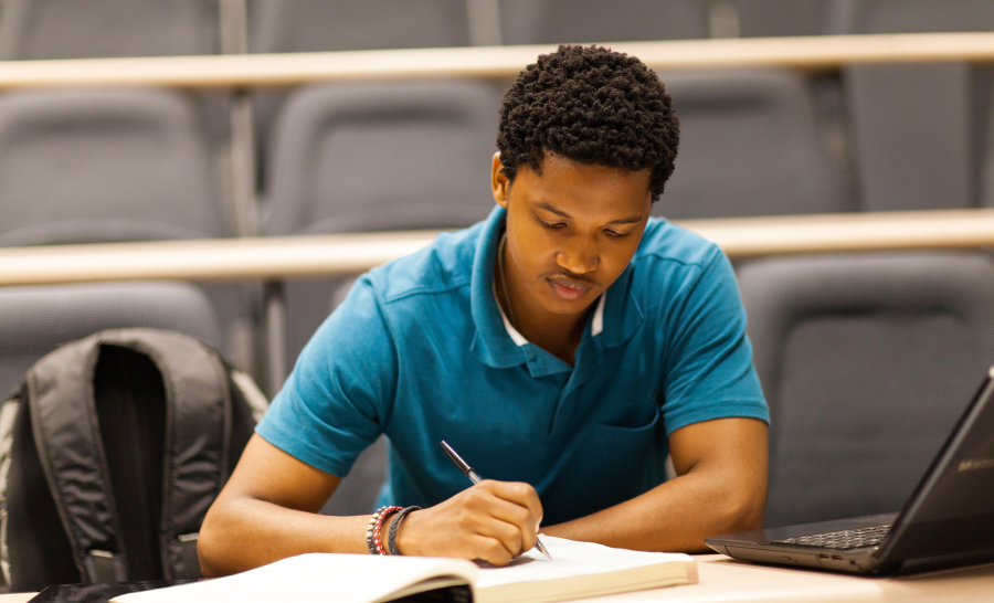 Black Male Studying in Class