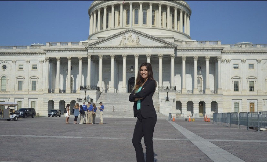 Intern in front of Capitol