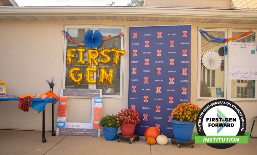 University of Illinois step and repeat surrounded by photo props outside campus building